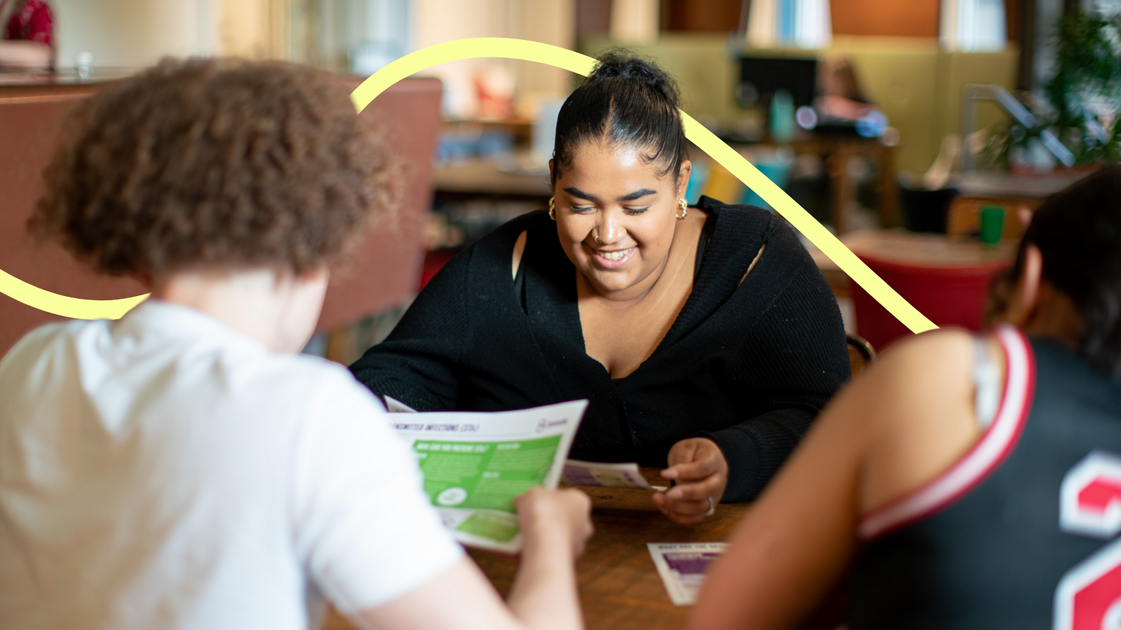 Three young people in a contraception lesson